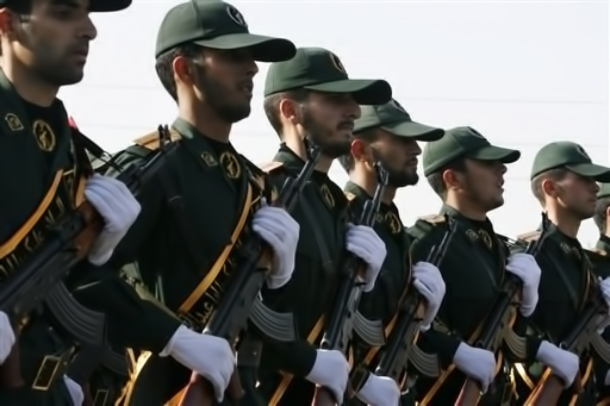 FILE - In this Sunday, Sept. 21, 2008 file photo, Iranian Revolutionary Guards members march during a parade ceremony, marking the 28th anniversary of the onset of the Iran-Iraq war (1980-1988), in front of the mausoleum of the late revolutionary founder Ayatollah Ruhollah Khomeini, just outside Tehran, Iran. Iran's elite Revolutionary Guard, aided by an affiliated volunteer militia, the Basij, is using the post-election turmoil to tighten its already powerful hold over the country, raising alarm among some Iranians that it is transforming the Islamic Republic into a military state. (AP Photo/Vahid Salemi, File)