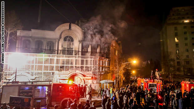 Iranian protesters set fire to the Saudi Embassy in Tehran during a demonstration against the execution of prominent Shiite Muslim cleric Nimr al-Nimr by Saudi authorities, on January 2, 2016. Nimr was a driving force of the protests that broke out in 2011 in Saudi Arabia's east, an oil-rich region where the Shiite minority of an estimated two million people complains of marginalisation. AFP PHOTO / ISNA / MOHAMMADREZA NADIMI / AFP / ISNA / MOHAMMADREZA NADIMI (Photo credit should read MOHAMMADREZA NADIMI/AFP/Getty Images)